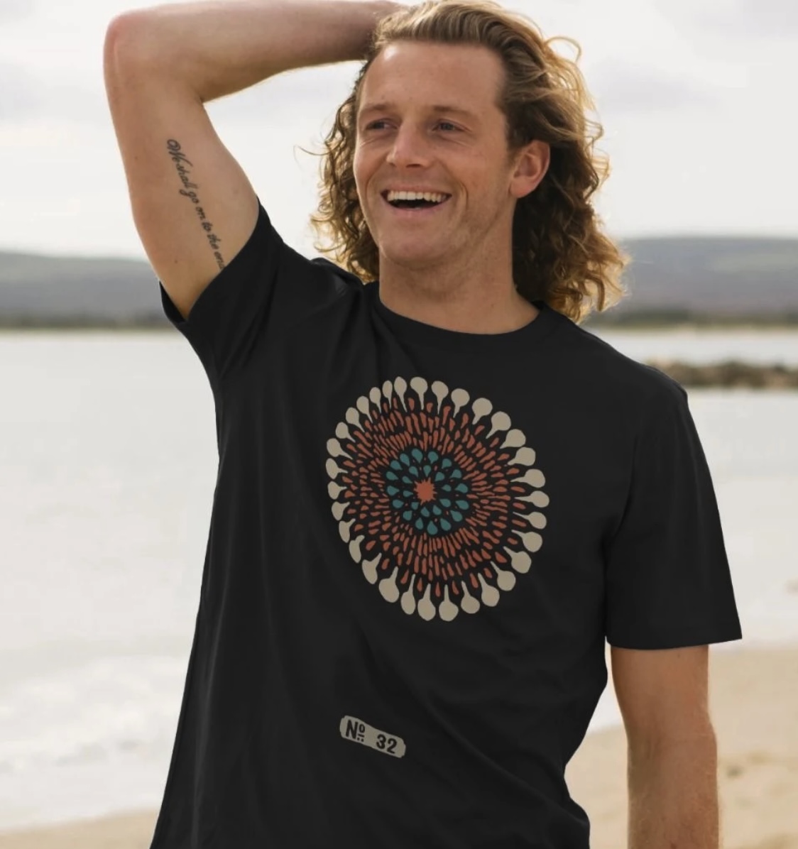 a man wearing a skronky sustainable t-shirt .